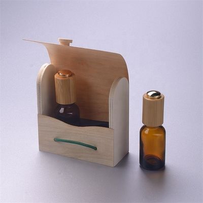 タケ子供の抵抗力がある点滴器のタケ箱が付いているガラス精油のびん