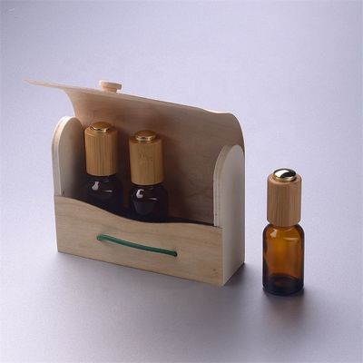 タケ子供の抵抗力がある点滴器のタケ箱が付いているガラス精油のびん
