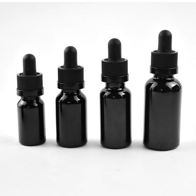 マットはCRの点滴器の帽子のびんによって黒い精油のガラス ビンを曇らした